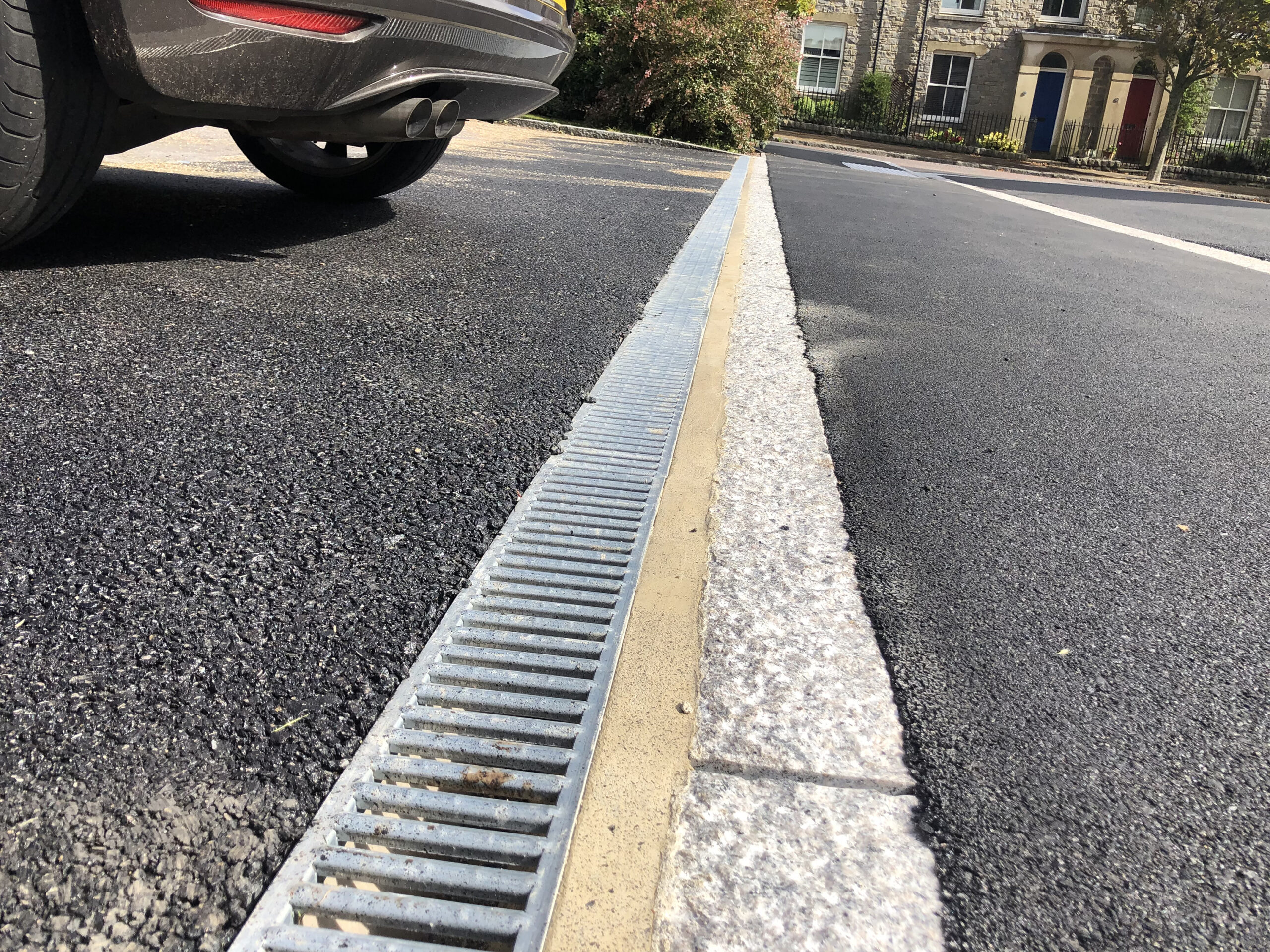 New road kerb and drainage channel construction in Dorset
